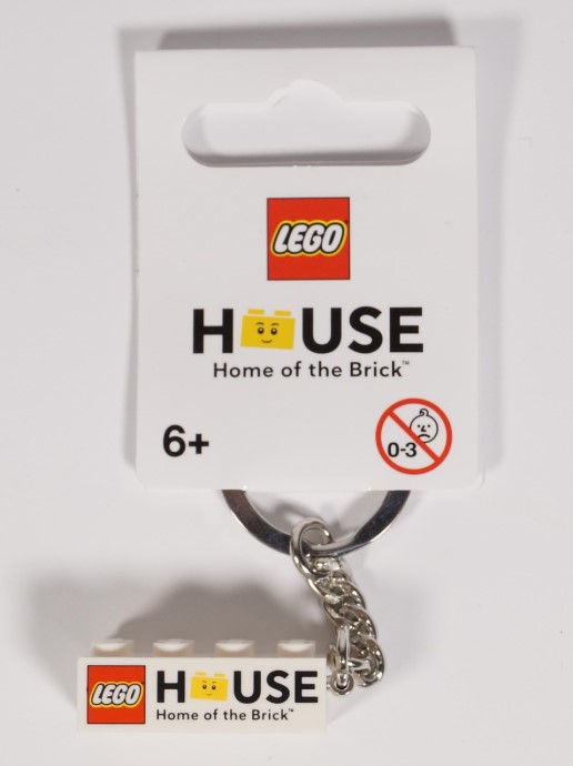 Конструктор LEGO (ЛЕГО) Gear 853712 The LEGO House 2x4 brick Keychain